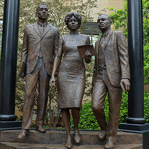An image of the unveiled statue which depicts Anderson, Monteith Treadwell and Solomon